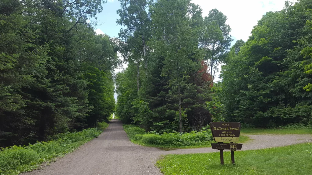 Wisconsin in Chequamegon-Nicolet National Forest is Perch Lake, a hike in camping, recreation hike bike and ski that will connect to the lauterman trails. Gravel road good cycling condition. HWY 70 forward and back access to Pentoga Road.