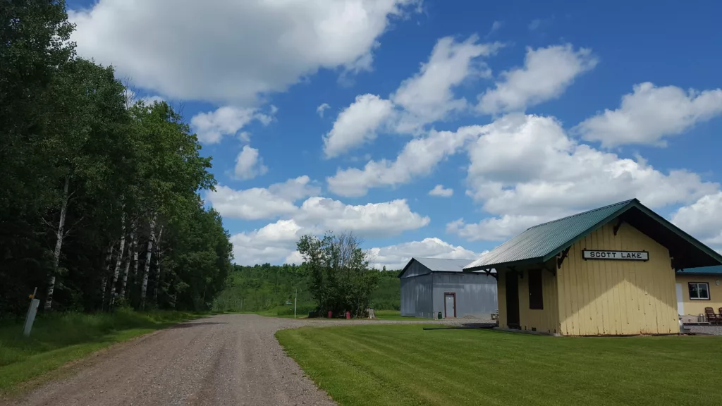 End of Scott Lake Road near the Brule River and ATV trail. There are some old train station buildings there.