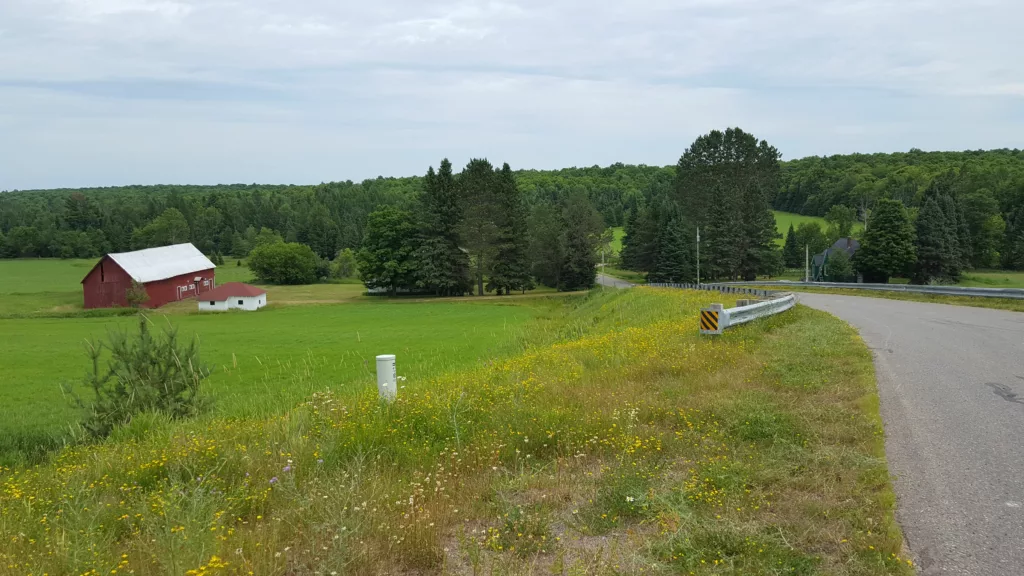 Farm located on old Beachwood Road west of Iron River takes you to Smokey Lake Road.