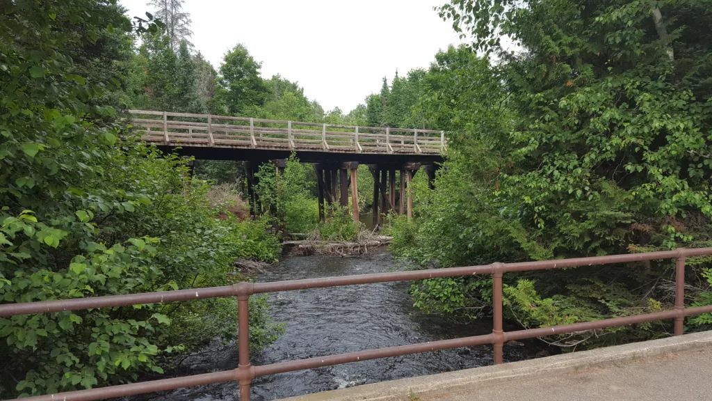 State Line Trail from the bike path crossing the Iron River in Michigan.